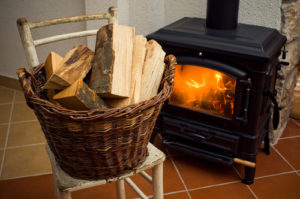 wood stove burning by firewood
