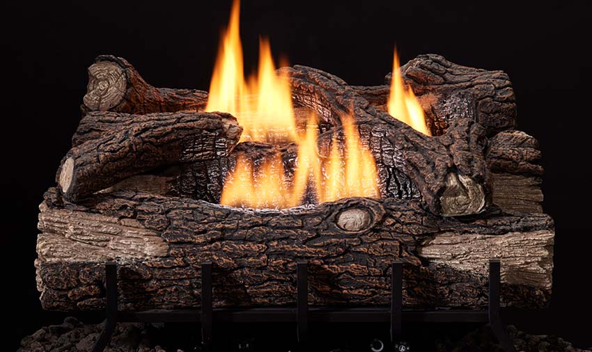 set of logs with fire coming through the middle